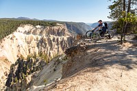 Overlooking the Grand Canyon of the Yellowstone from an off-road wheelchair by Jacob W. Frank. Original public domain image from Flickr