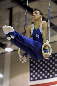 U.S. Air Force Academy Cadet Dan Klimkowski competes on the still rings during the Falcons home finale against the University of Illinois-Chicago at the academy's cadet gymnasium in Colorado March 7, 2010.