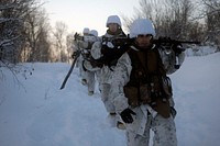 Marines make their way through the snow