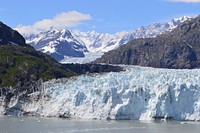 The Margerie Glacier and distant Mt. Fairweather (15.330') at the end of the Tar Inlet, Glacier Bay National Park and Preserve. Photo by Bob Meadows. Original public domain image from Flickr