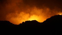 The Valley Fire glows at night. Original public domain image from Flickr