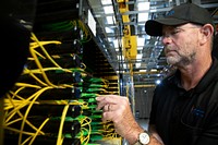 North Central Telephone Cooperative Corporation (NCTC) Central Office Technician Eddie Blankenship installs a fiber optic jumper cable at the Data Center, in Lafayette, Tennessee, on Sept 27, 2018.