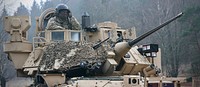 U.S. Army Sgt. Nicholas Ofield, assigned to the 91st Brigade Engineer Battalion, 1st Armored Brigade Combat Team, 1st Cavalry Division, takes up a defensive position in an M2 Bradley Fighting Vehicle during exercise Combined Resolve XI in Hohenfels, Germany, Dec. 6, 2018.