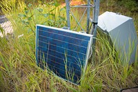 During the summer months, NRCS staff do maintenance at Snow Telemetry (SNOTEL) sites, replacing equipment like this solar panel which charges batteries which provide power for the site. Flathead County, Montana. August 2017.. Original public domain image from Flickr
