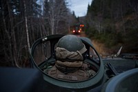 U.S. Marine Corps Cpl. Hayden Cedeno, an Assault Amphibious Vehicle (AAV) Crewman assigned to Easy Company, 2nd Battalion, 2nd Marine Regiment, 2nd Marine Division, operates an AAV during exercise Trident Juncture 18, Norway, Nov. 5, 2018.