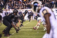 The U.S. Military Academy West Point defensive line prepares for a play during the 119th Army-Navy Game in Philadelphia Dec. 8, 2018. The Army defeated the Navy for the third year in a row. (U.S. Army photo by Spc. Dana Clarke). Original public domain image from Flickr