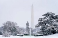 The South Lawn of the White House looking toward the Washington Monument is seen covered in snow. Original public domain image from Flickr