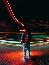 Man standing in traffic. Free public domain CC0 photo.