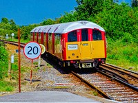 Moving train on a track. Free public domain CC0 photo.