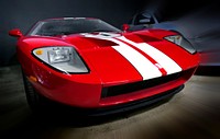 Ford GT model at Carroll Shelby Museum, Las Vegas.The Ford GT is an American mid-engine two-seater sports car that was produced by Ford for the 2005 and 2006 model years. The designers drew inspiration from Ford's GT40 racing cars of the 1960s.