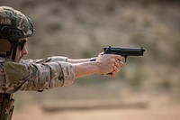 A special warfare airman with the New Jersey Air National Guard’s 227th Air Support Operations Squadron prepares to fire the M9 pistol during training on Joint Base McGuire-Dix-Lakehurst, N.J., May 31, 2019.