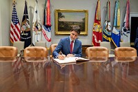 President Trump Meets with the Prime Minister of CanadaCanadian Prime Minister Justin Trudeau signs the guest book in the Roosevelt Room of the White House Thursday, June 20, 2019. (Official White House Photo by Shealah Craighead). Original public domain image from Flickr