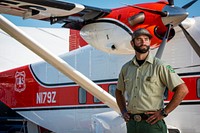 U.S. Forest Service smokejumper David Telian in front of the Short C-23A “Sherpa” during the 2019 EAA AirVenture Oshkosh July 27, 2019, in Oshkosh, Wisconsin.