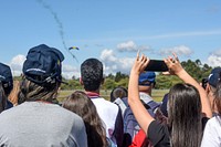 The Colombian Air Force Parachute Team, Gules Eagle, jump during Feria Aeronautical International—Colombia. Original public domain image from Flickr