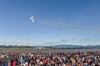 U.S. Air Force Thunderbird F-16 Fighting Falcon fighter jets perform a routine at Feria Aeronautical International—Colombia. Original public domain image from Flickr