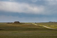Grass land and roadways in and near U.S. Department of Agriculture (USDA) Thunder Basin National Grassland, along Highway 16 and 450, between Rapid City, South Dakota, an Wright, Wyoming, on July 29, 2019.