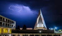 A late evening thunderstorm lights up the sky above the Cadet Chapel at the U.S. Air Force Academy, Colorado, August 2, 2019. (U.S. Air Force photo by Trevor Cokley) www.dvidshub.net. Original public domain image from <a href="https://www.flickr.com/photos/39955793@N07/48527432951/" target="_blank" rel="noopener noreferrer nofollow">Flickr</a>