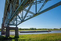 Barge traffic on the Chain of Rocks Canal, north of St. Louis, Missouri on the Mississippi River, August 2019.USDA Photo by Preston Keres. Original public domain image from Flickr