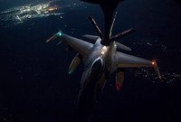 A U.S. Air Force F-16 Fighting Falcon conducts aerial refueling with a KC-135 Stratotanker assigned to the 340th Expeditionary Air Refueling Squadron out of Kandahar Airfield, Afghanistan, Aug. 19, 2019.