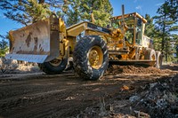 A U.S. Forest Service Road Maintenance Supervisor grades roads in the Whitetall Mountains of the Butte Ranger District of Beaverhead-Deerlodge National Forest Montana, September 13, 2019.<br/><br/>USDA Photo by Preston Keres. Original public domain image from <a href="https://www.flickr.com/photos/usdagov/48762197038/" target="_blank" rel="noopener noreferrer nofollow">Flickr</a>