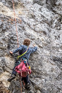 A climber scales a cliff near the Maidenrock area on Wisdom Ranger District of Beaverhead-Deerlodge National Forest Montana, September 15, 2019.USDA Photo by Preston Keres. Original public domain image from Flickr