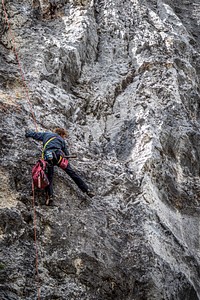 A climber scales a cliff near the Maidenrock area on Wisdom Ranger District of Beaverhead-Deerlodge National Forest Montana, September 15, 2019.USDA Photo by Preston Keres. Original public domain image from Flickr