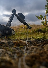 KEFLAVIK, Iceland– An Explosive Ordnance Disposal Technician, assigned to Explosive Ordnance Disposal Mobile Unit (EODMU) 8, utilizes a SUG-V robot to gain information on a simulated improvised explosive device (IED) during exercise Northern Challenge 2019 in Keflavik, Iceland, Sept. 11, 2019.