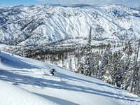 Man skiing on an un-named peak in the South Fork of the Salmon Watershed Idaho in the Payette National Forest near Yellow Pine, Idaho, USA. Original public domain image from Flickr