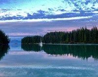 An anchored commercial fishing troller enjoys some serenity in Roosevelt Harbor on Zarembo Island. September 9, 2019. Tongass National Forest. Original public domain image from Flickr