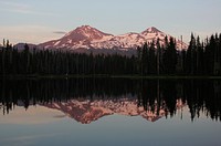 Three Sisters and Scott Lake at sunset from Scott Lake Campground. Photo taken by Matthew Tharp. Original public domain image from Flickr