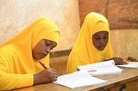 Grade 7 students at Mohamud Hilowle Primary and Secondary School during a class session in Wadajir district, Mogadishu, Somalia on 12 January 2020. AMISOM Photo / Ilyas Ahmed. Original public domain image from Flickr