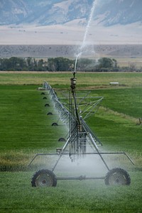 Pivot sprinkler irrigation system in Madison County, MT, on Aug 29, 2019. USDA Photo by Lance Cheung. Original public domain image from <a href="https://www.flickr.com/photos/usdagov/49427536688/" target="_blank" rel="noopener noreferrer nofollow">Flickr</a>