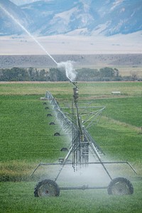 Pivot sprinkler irrigation system in Madison County, MT, on Aug 29, 2019. USDA Photo by Lance Cheung. Original public domain image from Flickr
