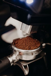 Ground coffee beans in a portafilter. Free public domain CC0 photo