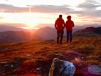 Couple watching the sunset, Tongass National Forest. Original public domain image from Flickr