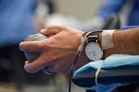 Person holding a sponge ball during blood donation visit.  Original public domain image from Flickr