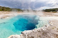 Sapphire Pool steams on a stormy morning. Original public domain image from Flickr