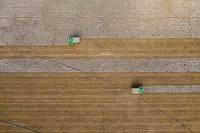 Aerial view of a cotton picking harvester, during the Ernie Schirmer Farms cotton harvest which has family, fellow farmers, and workers banding together for the long days of work, in Batesville, TX, on August 23, 2020.