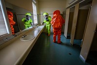 U.S. Army Sgts. Eric J. Boyer, left, and Nicky Lam, both Survey Team Members with the 21st Weapons of Mass Destruction-Civil Support Team (21st WMD-CST), New Jersey National Guard. Original public domain image from Flickr