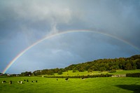 Double rainbows in a cloudy sky. Original public domain image from Flickr