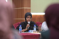 A participant makes a point during women's political representation forum organised by the office of Political Affairs of the African Union Mission in Somalia (AMISOM), in Mogadishu, Somalia on 2 November 2020. AMISOM Photo/ Omar Abdisalan. Original public domain image from Flickr