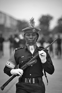 A female member of the Nigerian FPU (Formed Police Unit) performs in a medal ceremony on April 9 in Mogadishu, Somalia.
