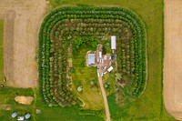 Fleshman Farm in Teton County Montana now includes a newly installed high tunnel (back right) and pollinator planting (to left of windbreak), both installed through EQIP. June 2020. Original public domain image from Flickr