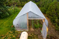 High Tunnel Farming on Fleshman Farm. Installed in May 2020 through financial assistance of NRCS, EQIP (Environmental Quality Incentives Program). Photo taken June 2020 in Teton County, Montana. Original public domain image from Flickr