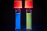 Samples of coal-derived graphene quantum dots that glow when exposed to light.