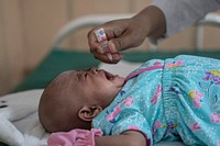 USAID Jalin supports MNH during COVID-19, Mr Tarhedi’s baby get vaccine in Kussudiati midwife private clinic on Monday , November 16, 2020 at Tangerang, Indonesia. (Oscar Siagian/ USAID-JALIN). Original public domain image from Flickr