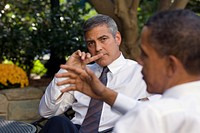 President Barack Obama discusses the situation in Sudan with actor George Clooney during a meeting outside the Oval Office, Oct. 12, 2010.