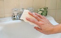 Bathroom cleaning by sponge. Free public domain CC0 photo.