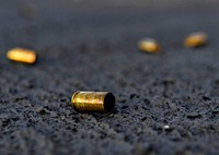 Horn of Africa (February 06, 2021) Expended 9mm service pistol casings rest on the flight deck during a crew serve weapon qualification course on board the Expeditionary Sea Base USS Hershel “Woody” Williams (ESB 4) from the Horn of Africa, Feb. 6, 2021.