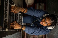 ROTA, Spain (March 14, 2021) Gas Turbine Systems Technician (Mechanical) Fireman Makayla Edwards climbs a ladder in the main engineering space aboard the Arleigh Burke-class guided-missile destroyer USS Porter (DDG 78) while the ship returns to Rota, Spain, March 14, 2021.